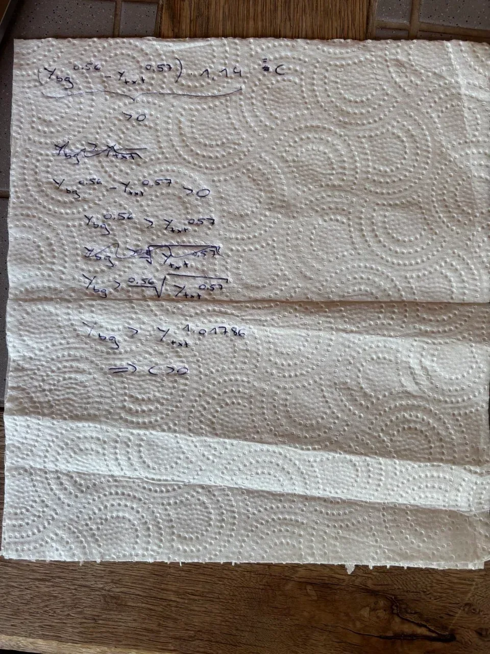 A photo of APCA related math I did on a napkin during the climbing trip