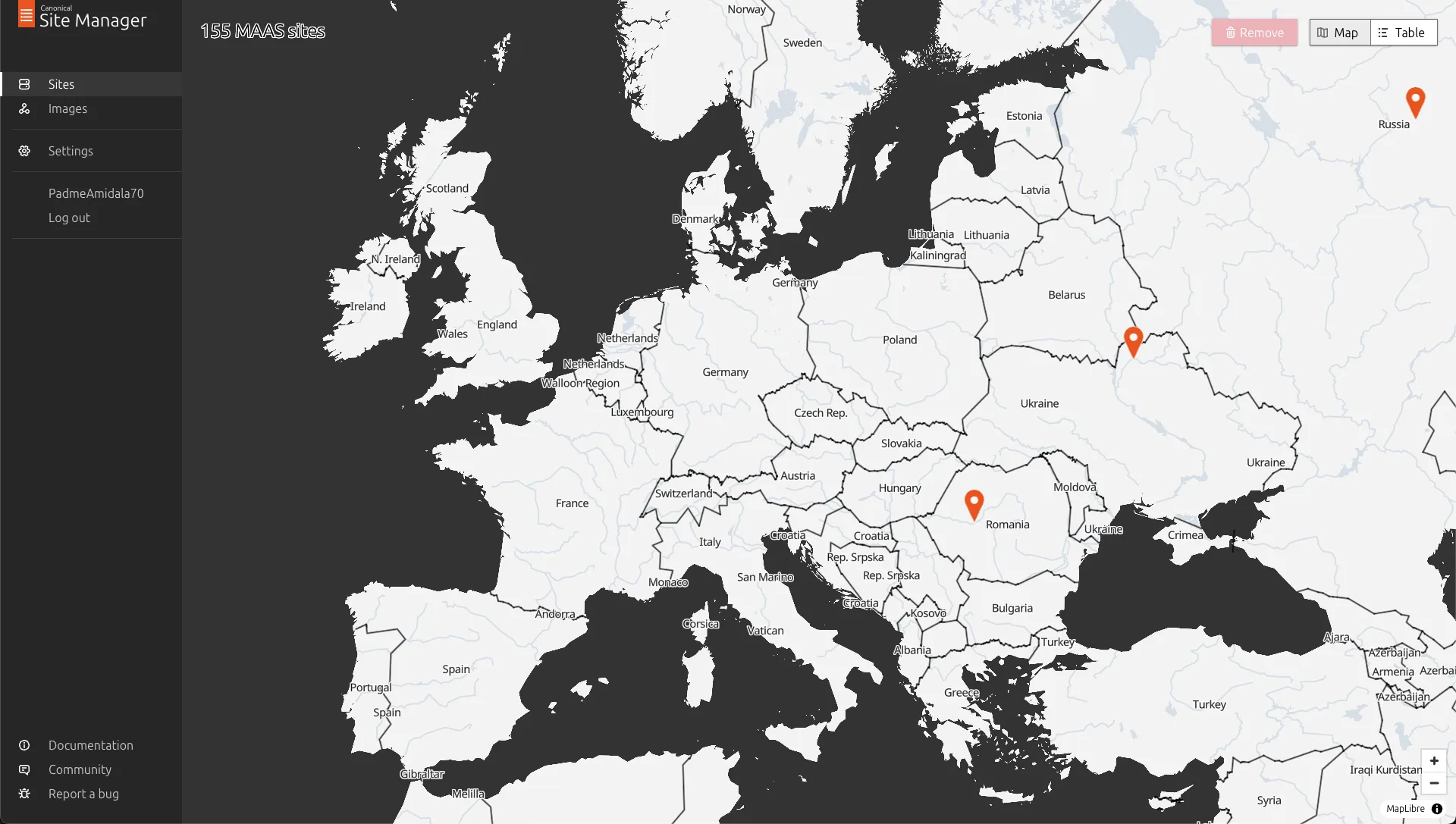 Site Manager with custom optimized map tiles showing the same European view but with a clean, minimal dark-themed design using only country borders and major city labels, matching the Canonical brand and requiring only around 100MB of storage